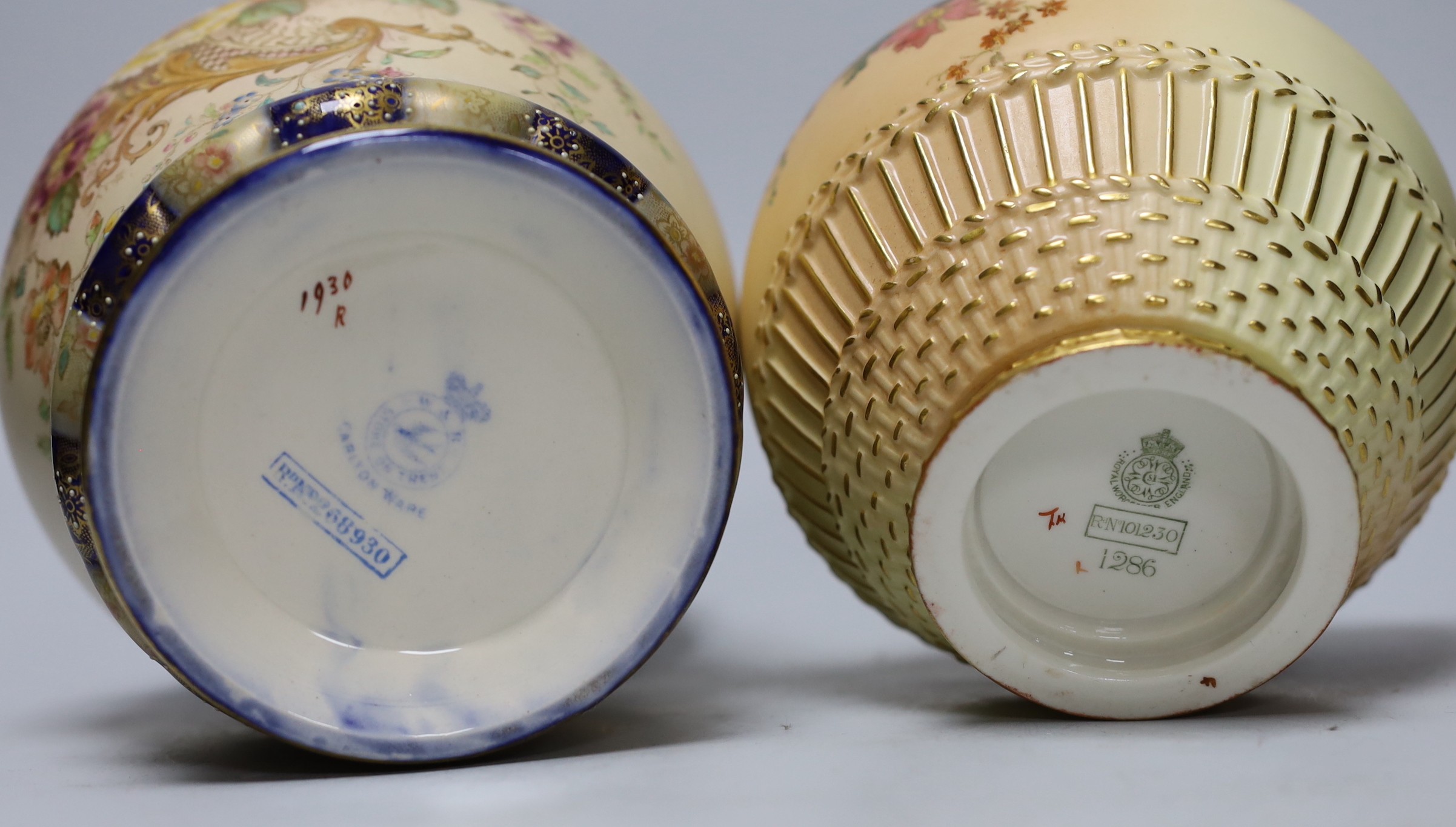 Three Royal Worcester blush vessels and a Carltonware biscuit barrel